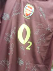 Arsenal Blackcurrent shirt signed by  approx 18