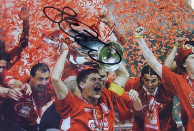 Steve Gerrard holds aloft the Champions league trophy