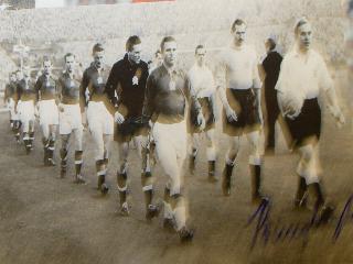 Billy Wright signed image leading out England