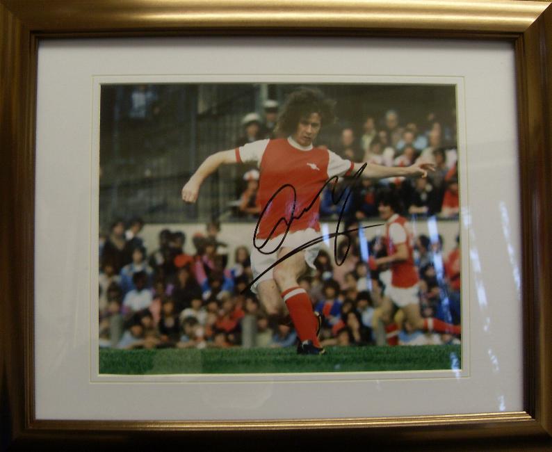 Liam Brady signed Arsenal picture