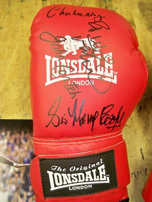 Boxing glove signed by Charlie Magri, Sir Henry Cooper, Frank Bruno, & John Conteh