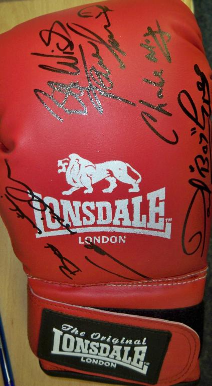 Boxing Glove signed by  4 world Champions