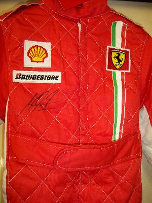 Michael Schumacher signed childrens Ferrari  jumpsuit rare