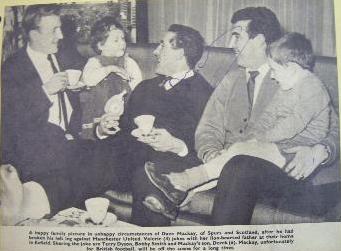 Dave Mackay signed vintage image after he had broken his leg against Manchester United