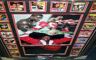 Frank Bruno glove and programme signed presentation. 