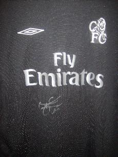Chelsea black shirt signed by Drogba