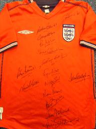 England Red Shirt signed by 1966 team INCLUDING BOBBY CHARLTON plus others
