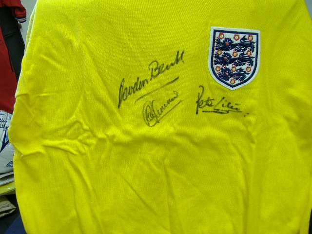  Yellow England goalkeepers jersey signed by Banks, Shilton & Clemence