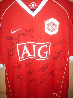 Manchester United current home shirt also available blue and black
