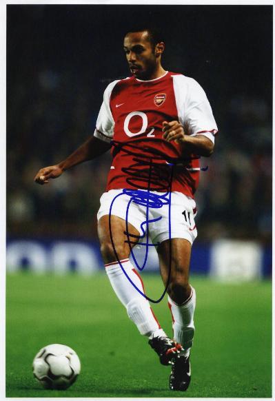 Thierry Henry in red Arsenal kit