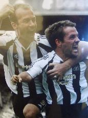 Alan Shearer & Michael Owen celebrate  glossy photograph