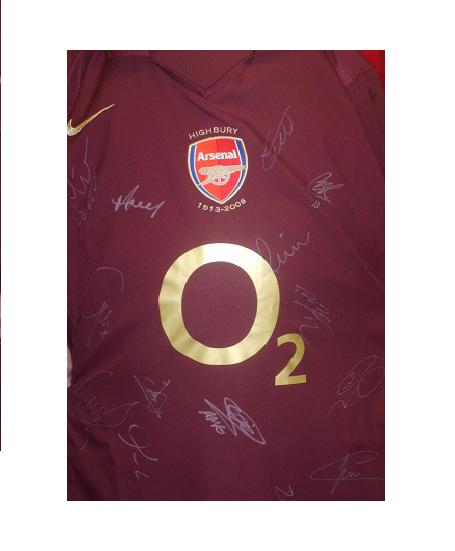 Arsenal  blackcurrant shirt signed by various